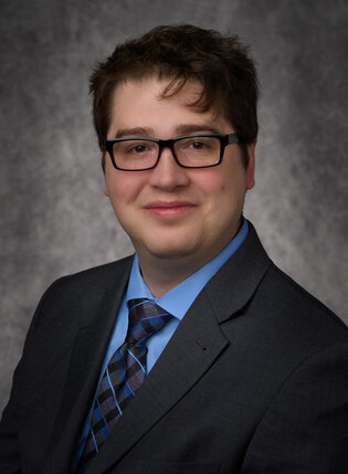 Christopher B. Enos